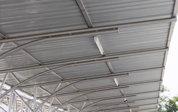 installing New Marston metal roofing